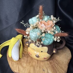 Composition fondant senteur pet de singe