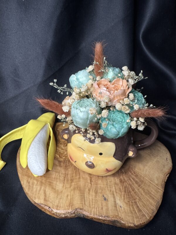 Composition fondant senteur pet de singe